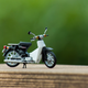 Illustration for article titled Land of the Rising Sun - Day: Gachapon Honda Super Cub